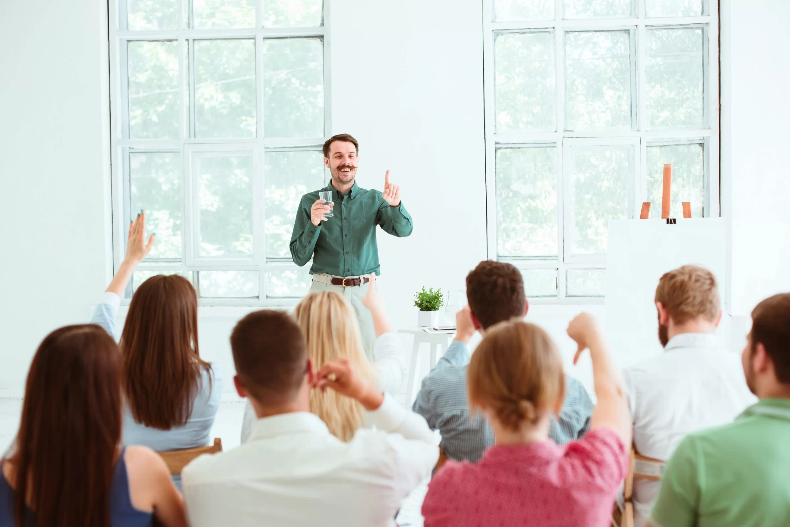 speaker business meeting conference hall scaled